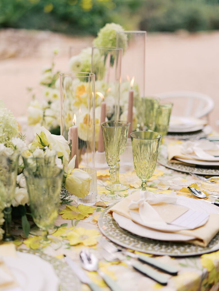 Yellow reception table with garden-inspired florals and romantic details at Villa Antonia, photographed on film by Kelsey Applebaum