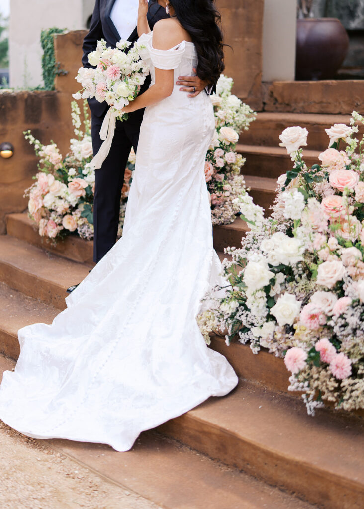 Romantic ceremony moment at Villa Antonia with lush florals by Truth & Blooms, planning by Simply XO Events, photographed by Kelsey Applebaum