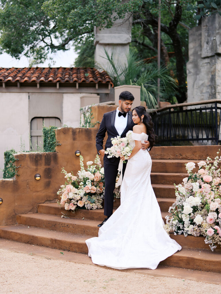 Romantic ceremony moment at Villa Antonia with lush florals by Truth & Blooms, planning by Simply XO Events, photographed by Kelsey Applebaum