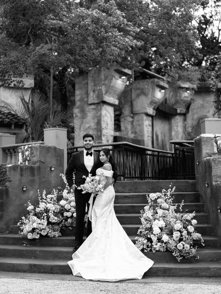 Romantic ceremony moment at Villa Antonia with lush florals by Truth & Blooms, planning by Simply XO Events, photographed by Kelsey Applebaum