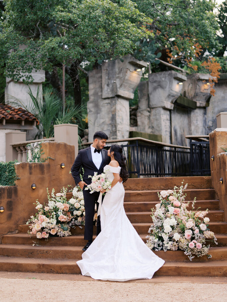 Romantic ceremony moment at Villa Antonia with lush florals by Truth & Blooms, planning by Simply XO Events, photographed by Kelsey Applebaum
