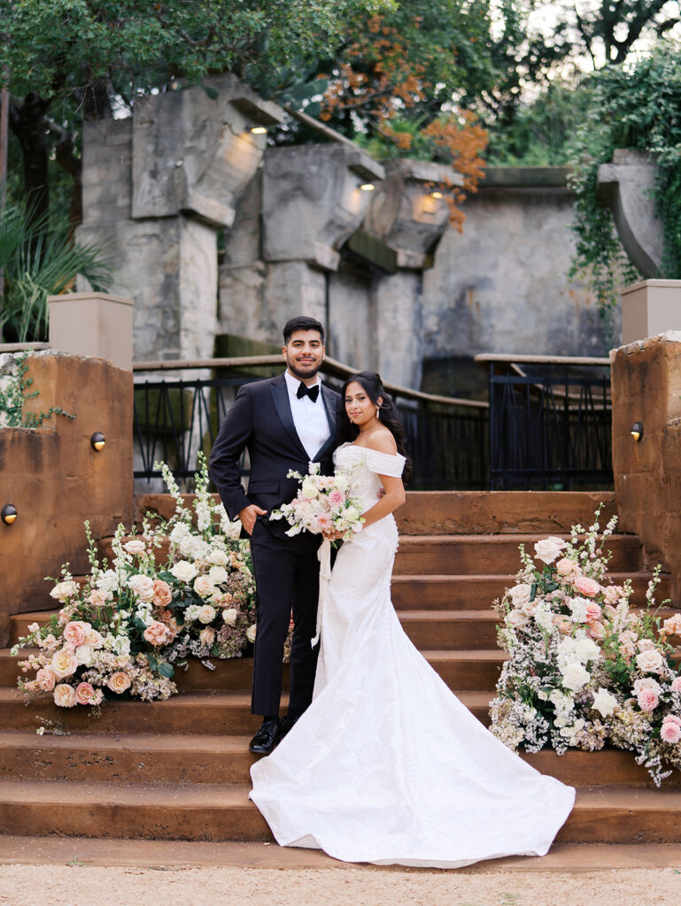 Romantic ceremony moment at Villa Antonia with lush florals by Truth & Blooms, planning by Simply XO Events, photographed by Kelsey Applebaum