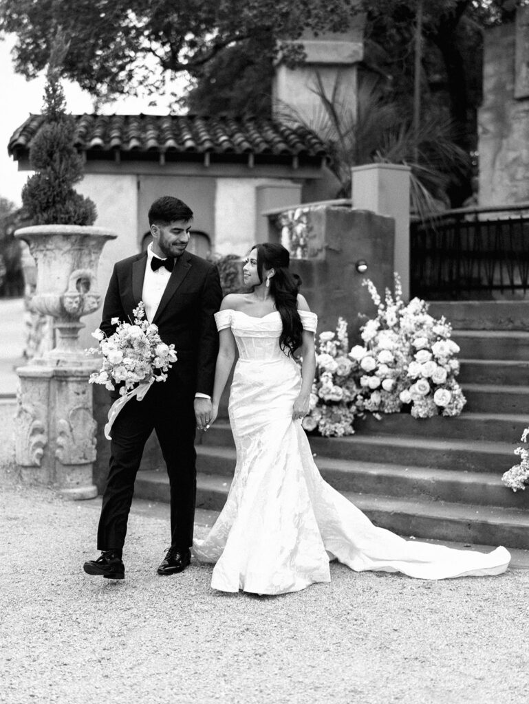 Romantic ceremony moment at Villa Antonia with lush florals by Truth & Blooms, planning by Simply XO Events, photographed by Kelsey Applebaum