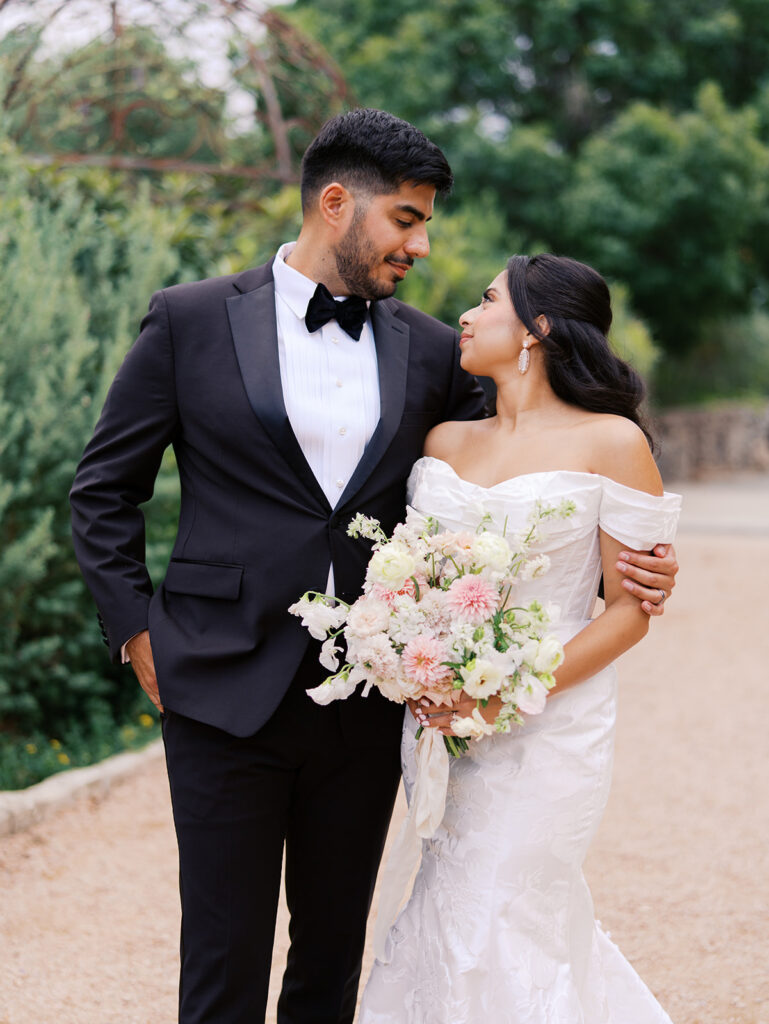 Romantic ceremony moment at Villa Antonia with lush florals by Truth & Blooms, planning by Simply XO Events, photographed by Kelsey Applebaum