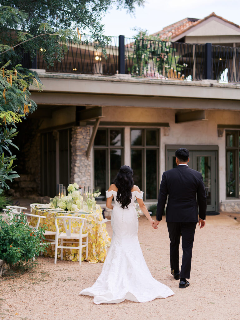 Romantic ceremony moment at Villa Antonia with lush florals by Truth & Blooms, planning by Simply XO Events, photographed by Kelsey Applebaum