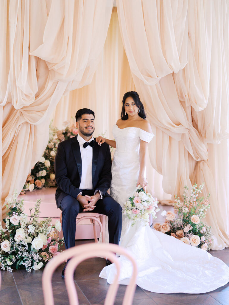 Bride and groom portrait at Villa Antonia with pink florals, captured by Kelsey Applebaum Photography