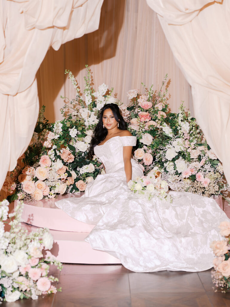 Bride in Melange Bridal gown standing on stone terrace at Villa Antonia, captured by Kelsey Applebaum Photography