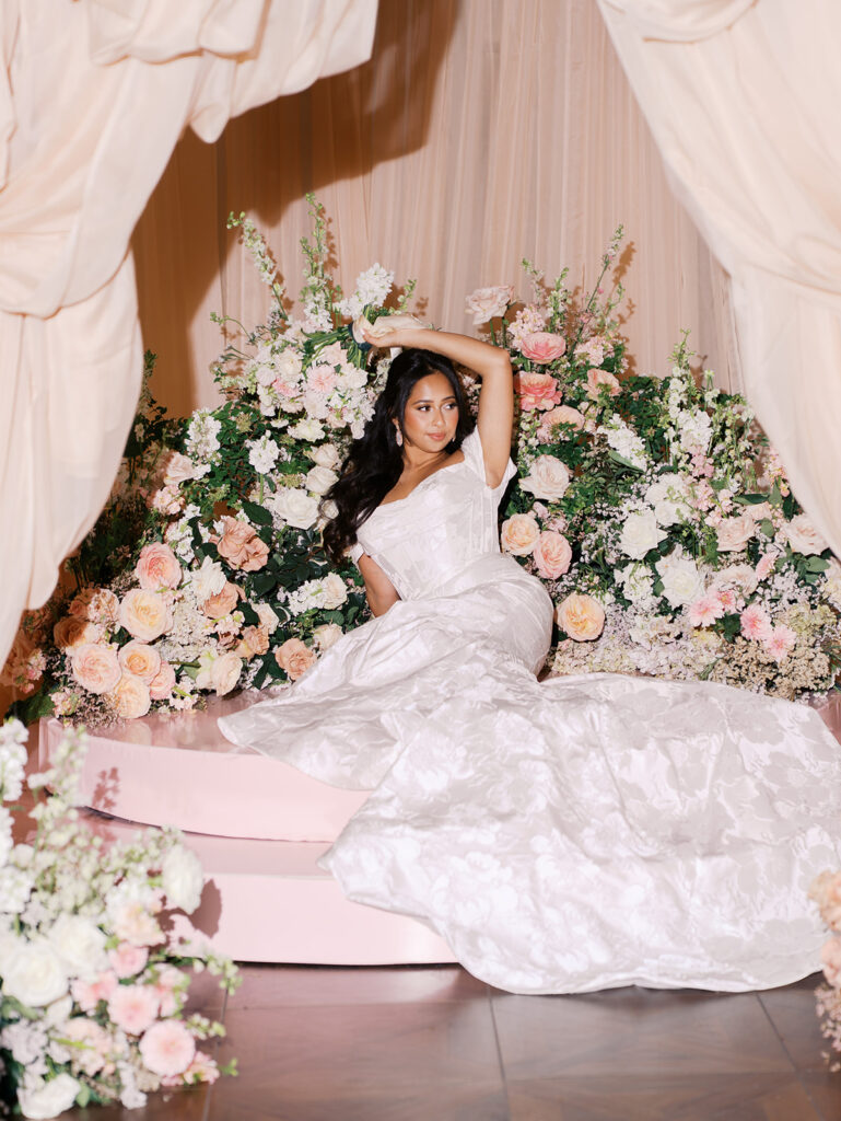 Bride in Melange Bridal gown standing on stone terrace at Villa Antonia, captured by Kelsey Applebaum Photography