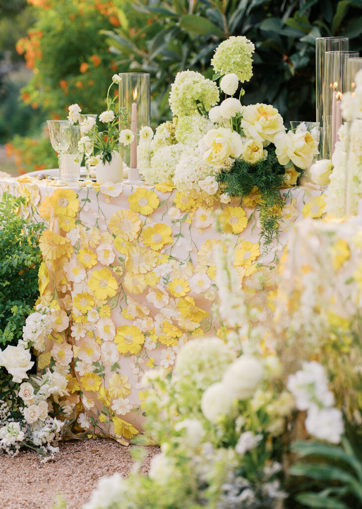 Wedding tablescape with pastel yellow linens and florals by Truth & Blooms at Villa Antonia, photographed by Kelsey Applebaum