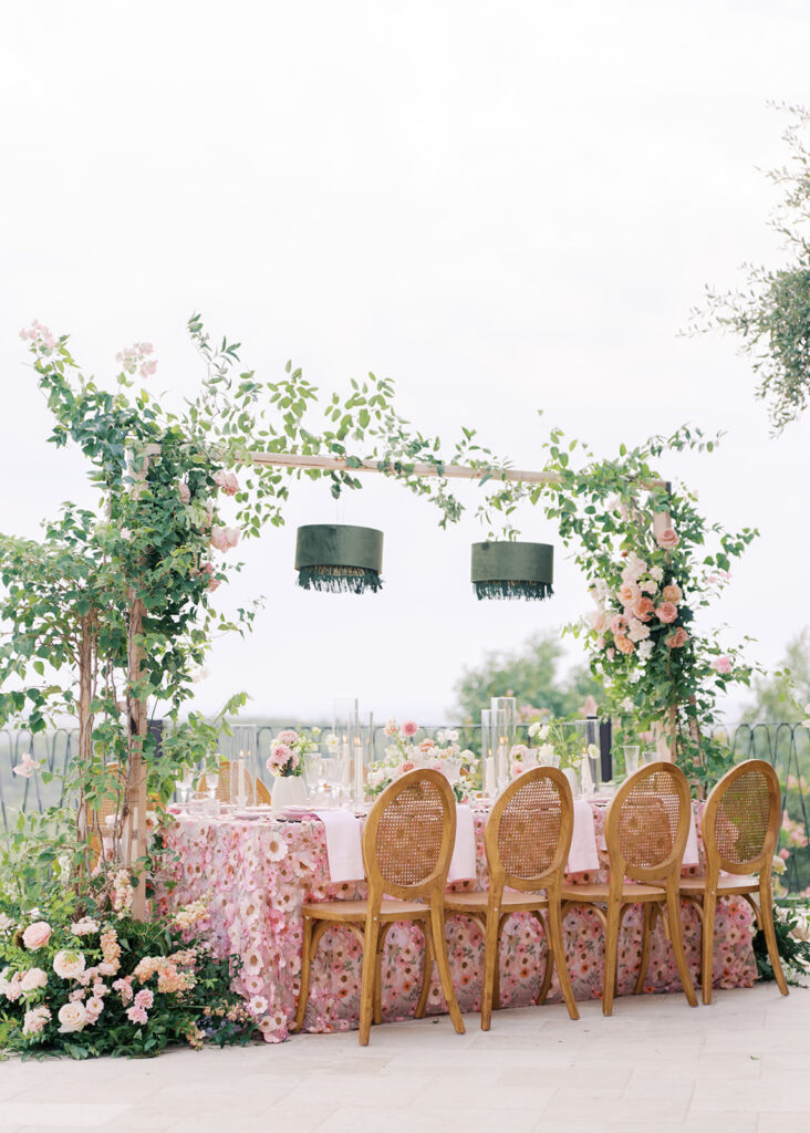 Romantic pink wedding tablescape with lush florals by Truth & Blooms at Villa Antonia, photographed by Kelsey Applebaum