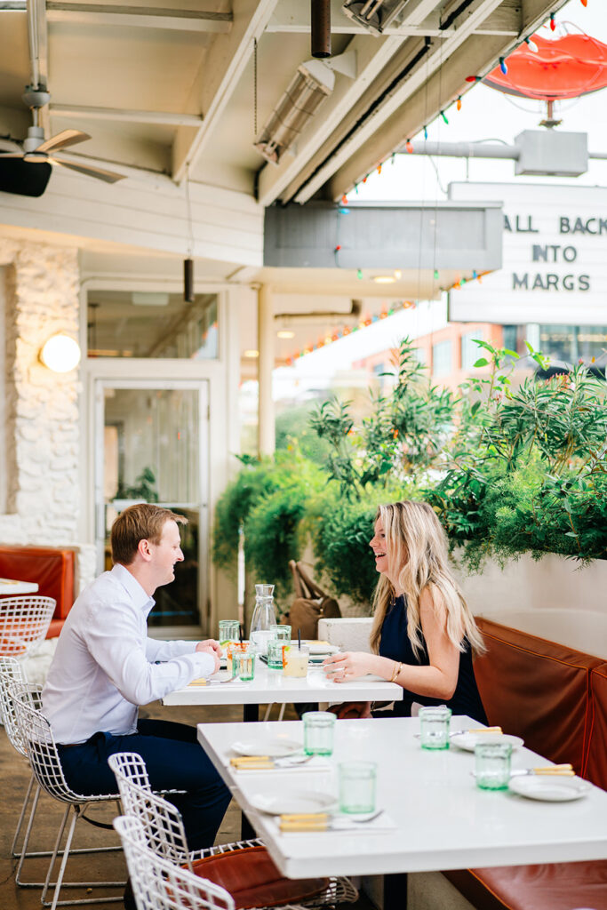 engagement session on the iconic south congress on film bride and groom walking