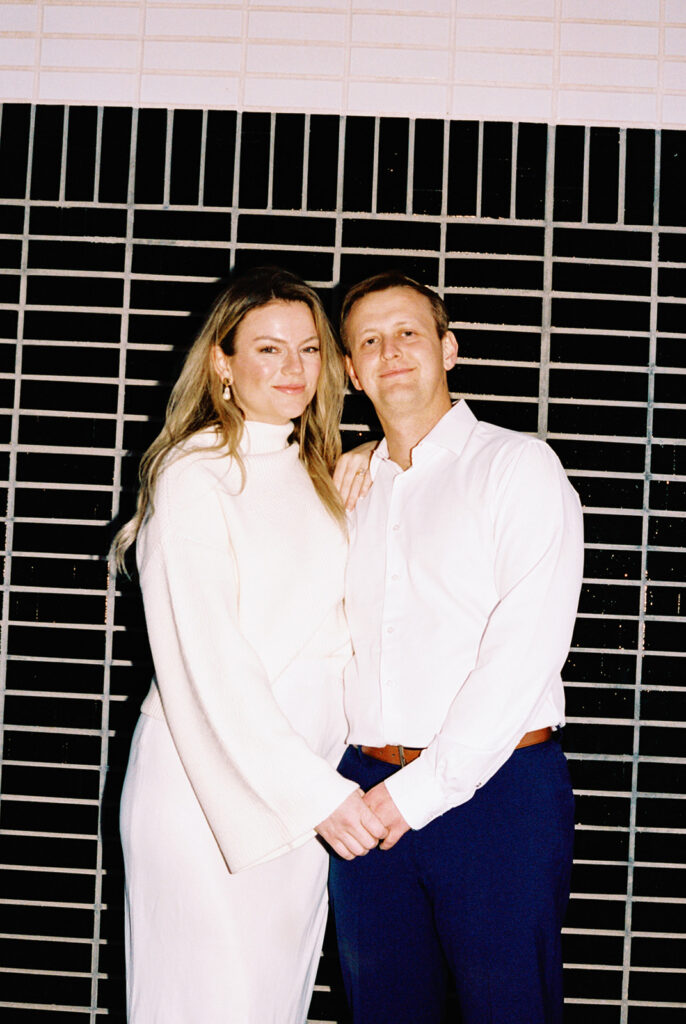 engagement session on the iconic south congress on film bride and groom walking