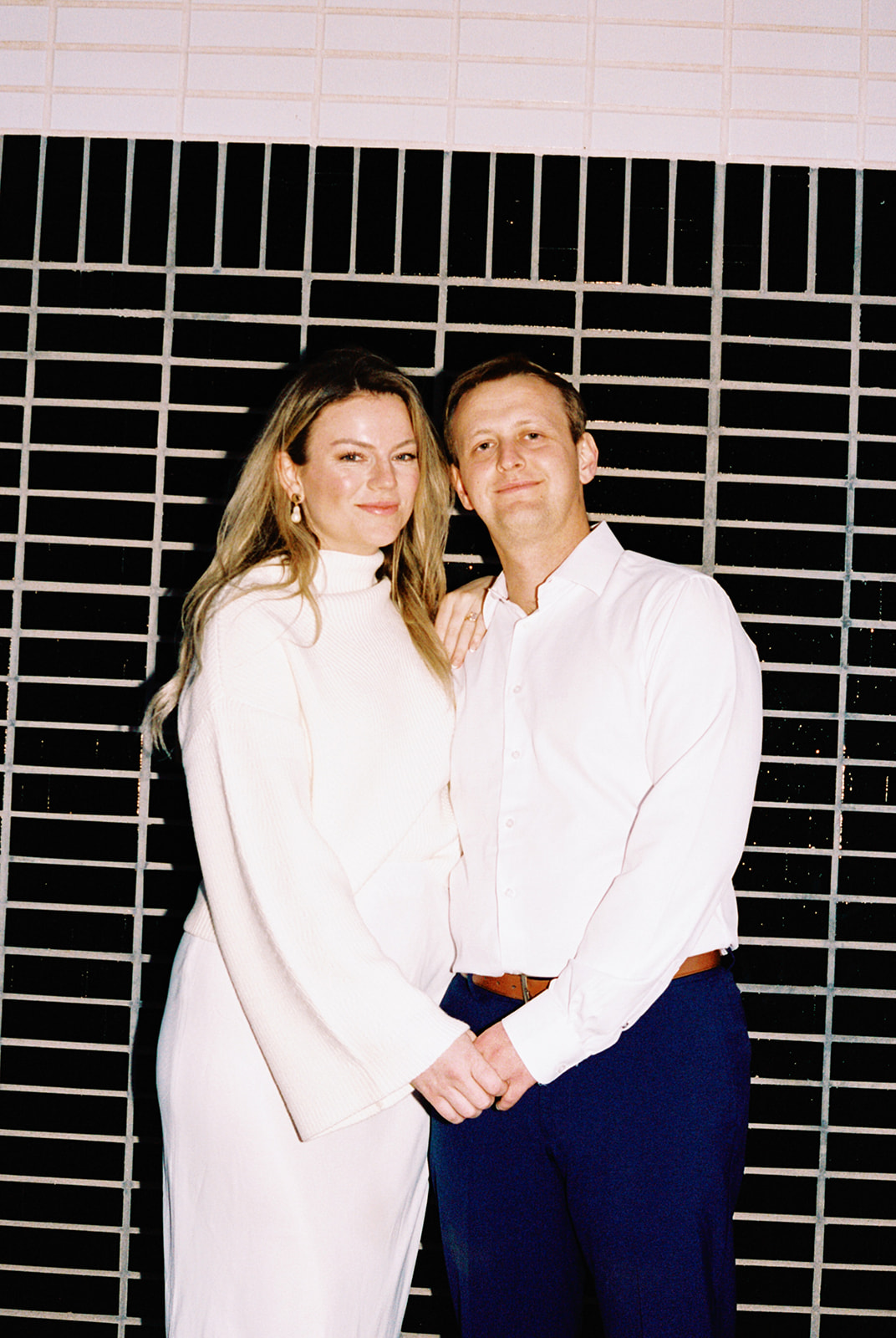 engagement session on the iconic south congress on film bride and groom walking