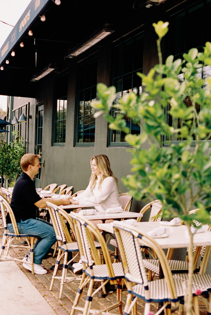 engagement session on the iconic south congress on film bride and groom walking