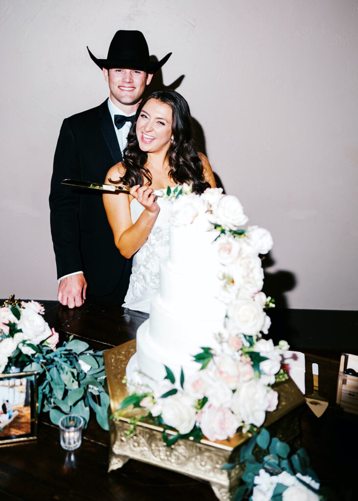 Texas Hill Country wedding bride and groom cake cutting