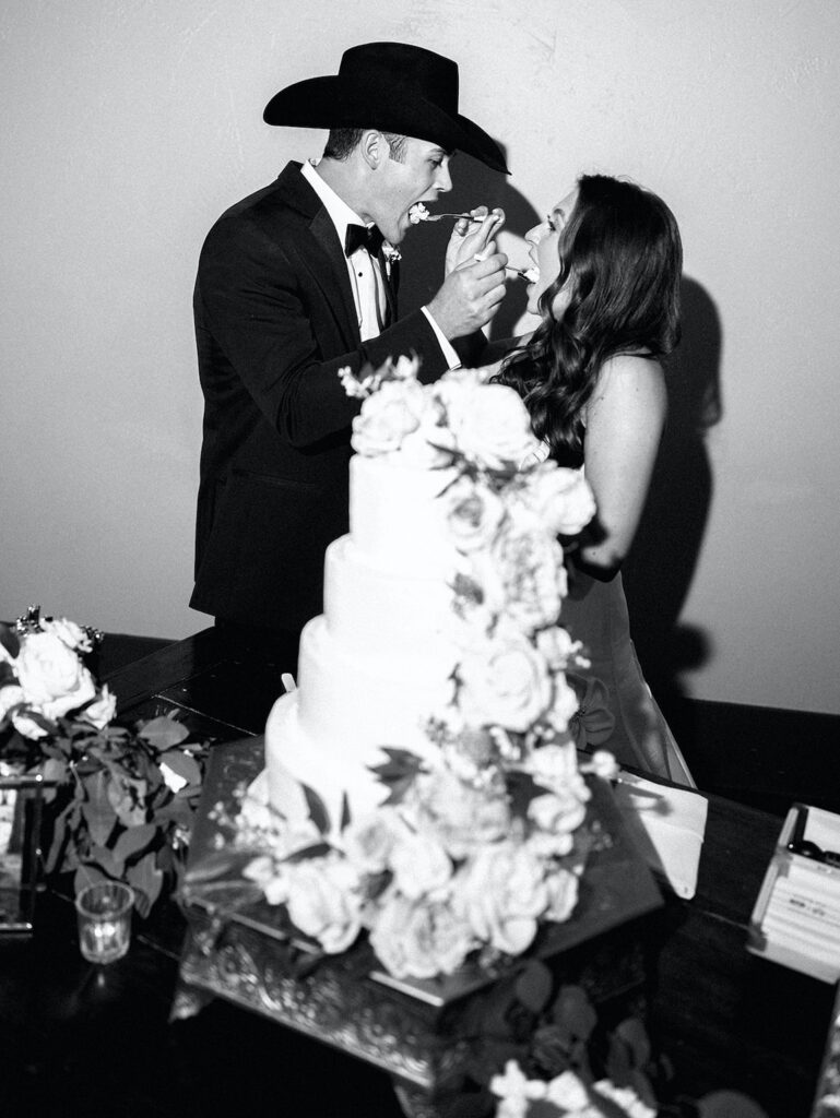 Texas Hill Country wedding bride and groom cake cutting