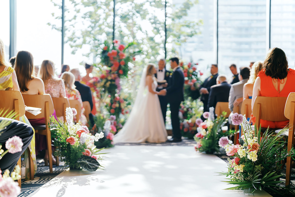 lush floral ceremony for a wedding at the austin proper