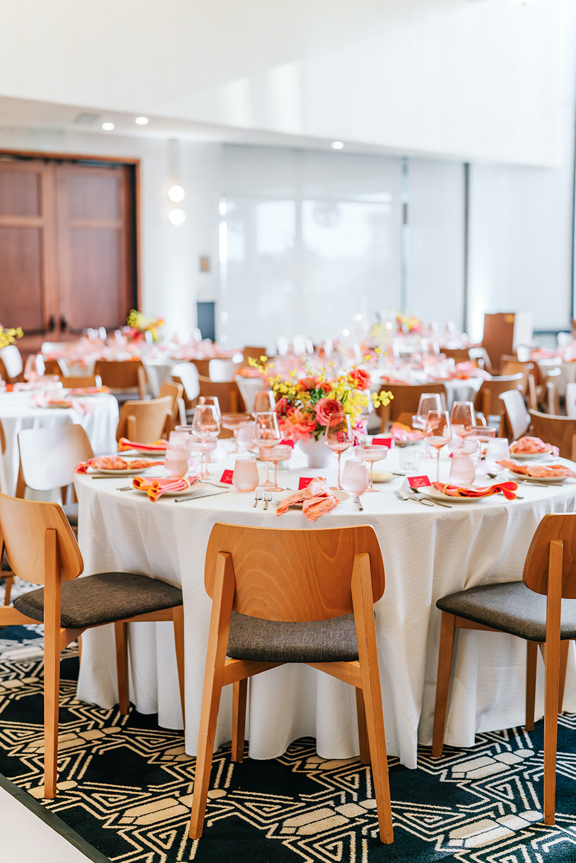 lush vibrant flowers for a wedding at the austin proper reception details