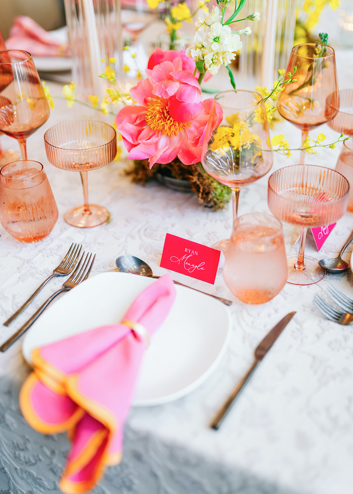 lush vibrant flowers for a wedding at the austin proper reception details