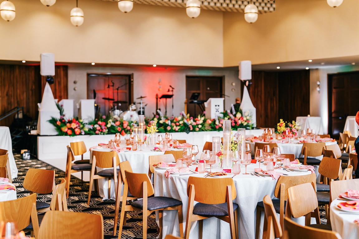 lush vibrant flowers for a wedding at the austin proper reception details