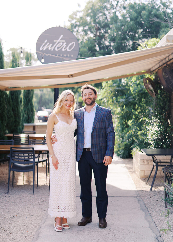 Bride and groom sharing a quiet moment together during their rehearsal dinner at Intero in Austin.