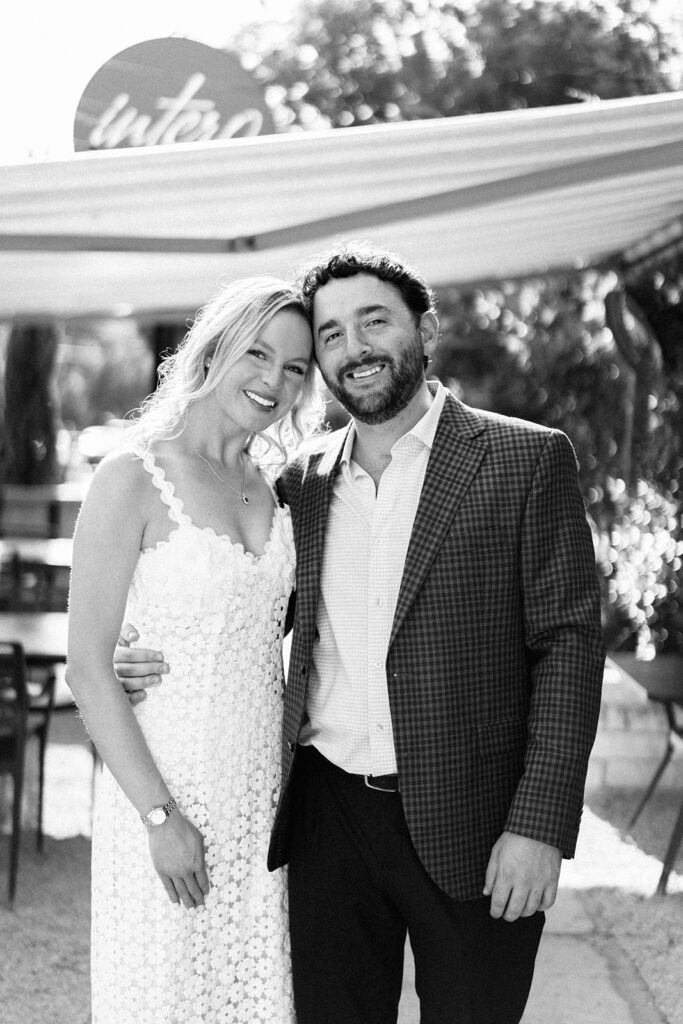 Bride and groom sharing a quiet moment together during their rehearsal dinner at Intero in Austin.