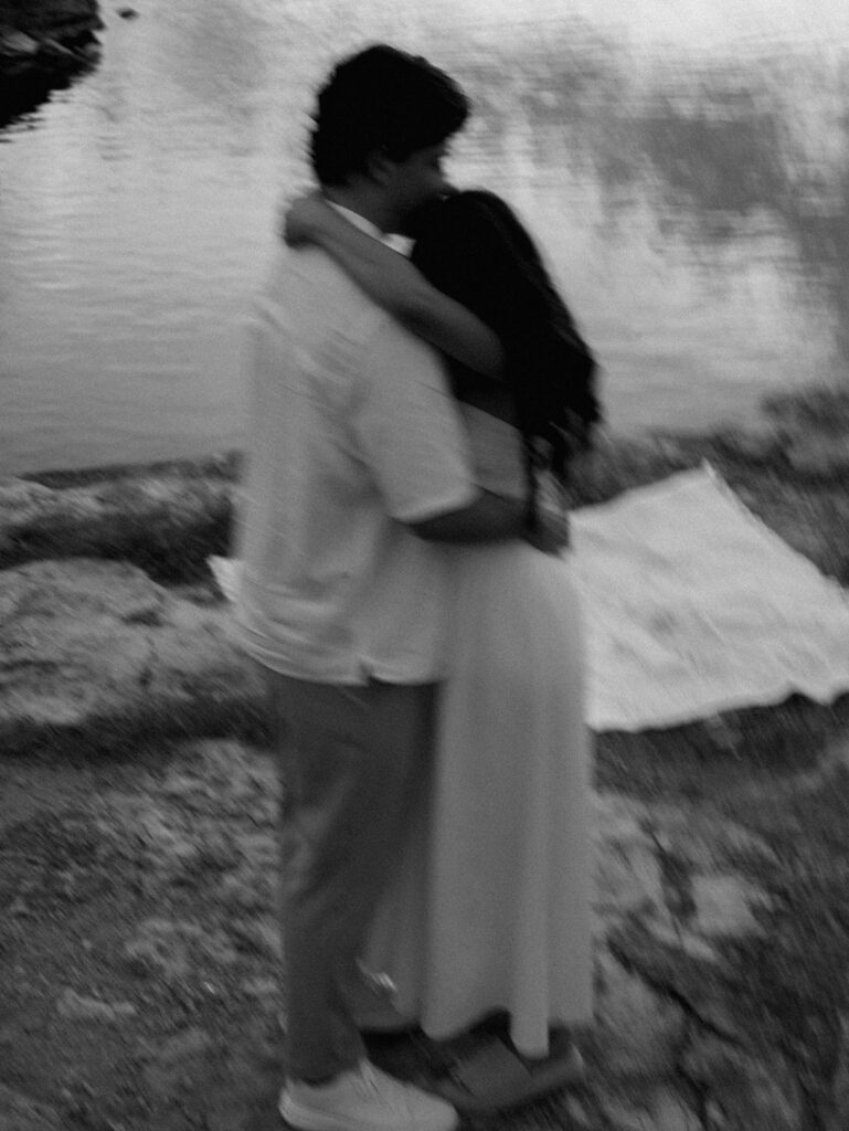 Playful and candid Lake Travis proposal photography of newly engaged couple enjoying the moment together.