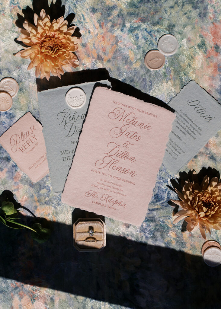 Refined wedding flat lay featuring romantic stationery by Anna & Ink, delicate florals, and timeless southern details.