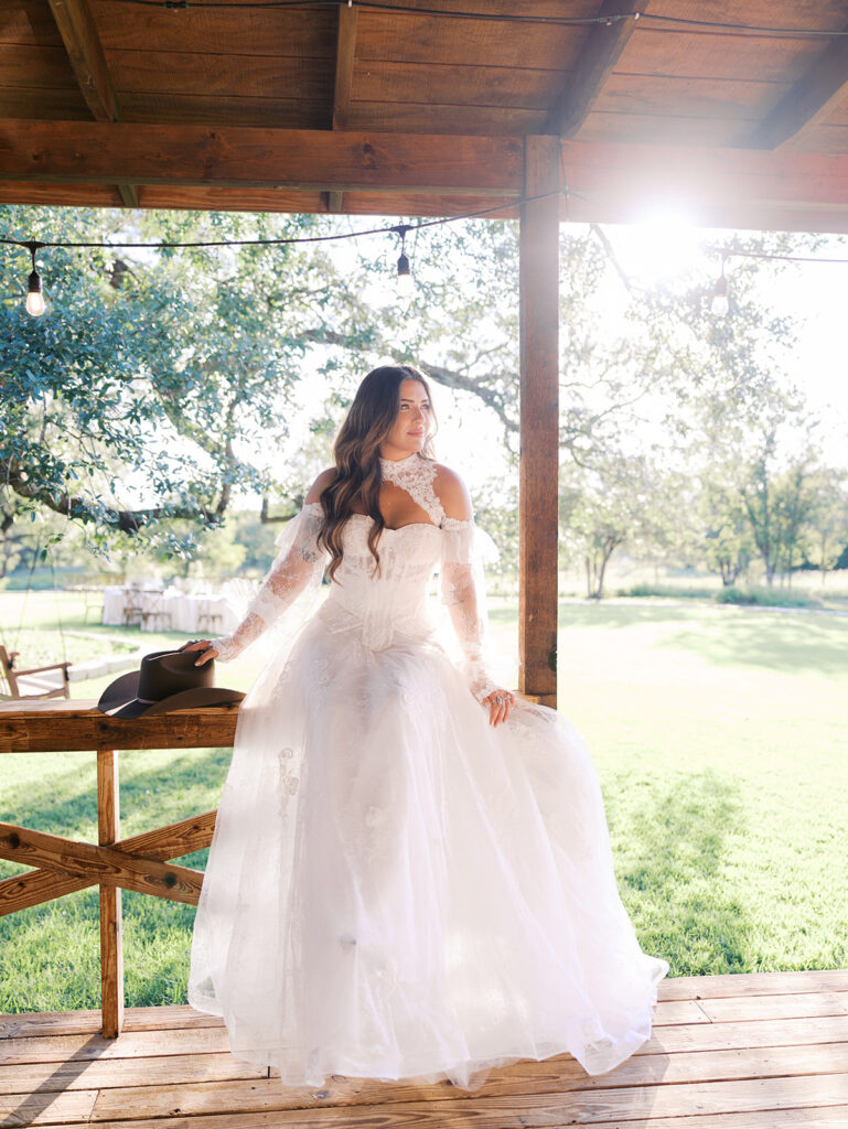 Bride and groom at The Adelphia wedding editorial in Lampasas, TX, surrounded by romantic florals and southern charm
