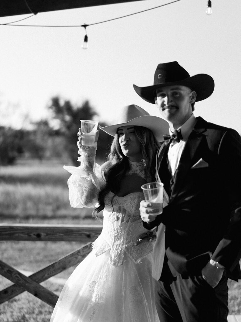 Bride and groom at The Adelphia wedding editorial in Lampasas, TX, surrounded by romantic florals and southern charm