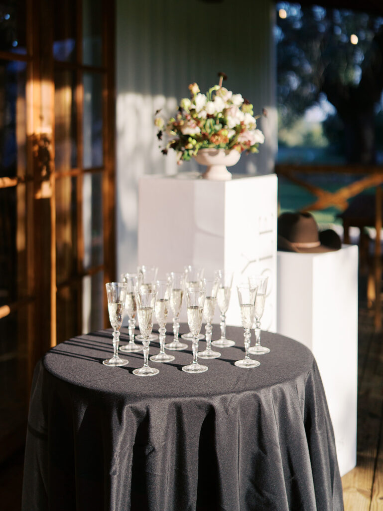 Romantic southern wedding tablescape at The Adelphia with lush florals, soft candlelight, and elegant rentals styled by Simply Bliss Events