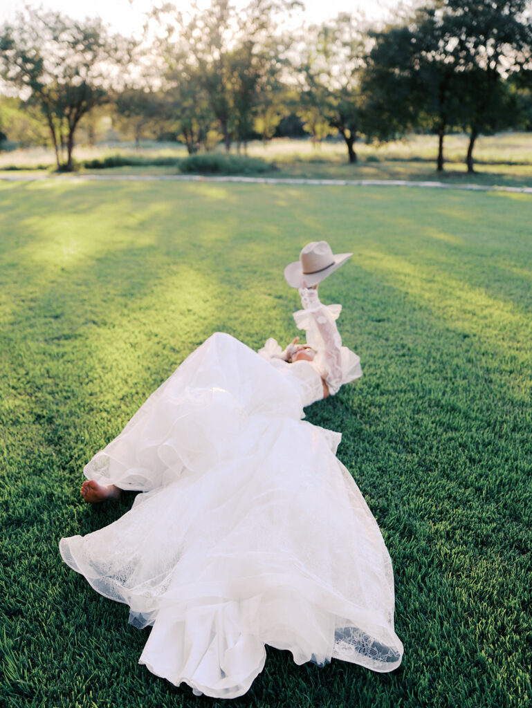 Bride and groom at The Adelphia wedding editorial in Lampasas, TX, surrounded by romantic florals and southern charm