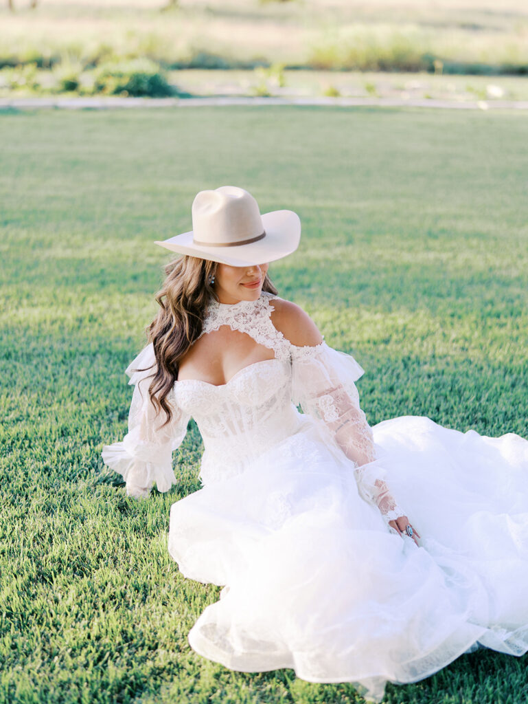 Bride and groom at The Adelphia wedding editorial in Lampasas, TX, surrounded by romantic florals and southern charm