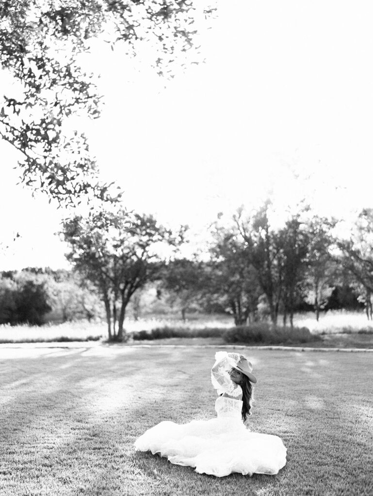 Bride and groom at The Adelphia wedding editorial in Lampasas, TX, surrounded by romantic florals and southern charm