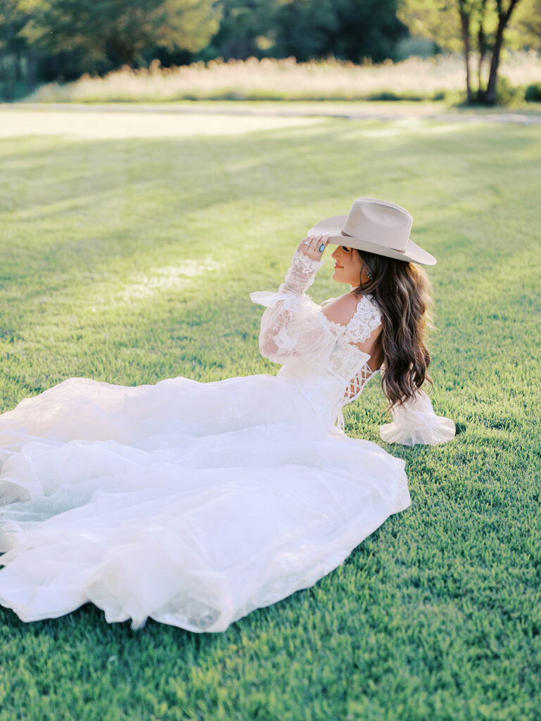 Bride and groom at The Adelphia wedding editorial in Lampasas, TX, surrounded by romantic florals and southern charm