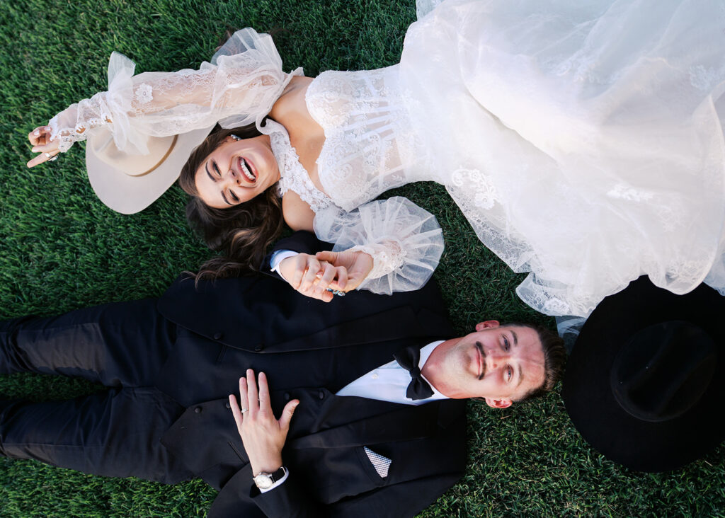 Bride and groom at The Adelphia wedding editorial in Lampasas, TX, surrounded by romantic florals and southern charm