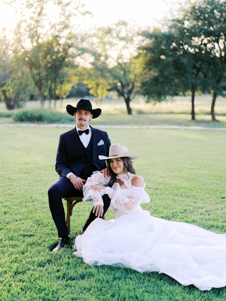 Bride and groom at The Adelphia wedding editorial in Lampasas, TX, surrounded by romantic florals and southern charm