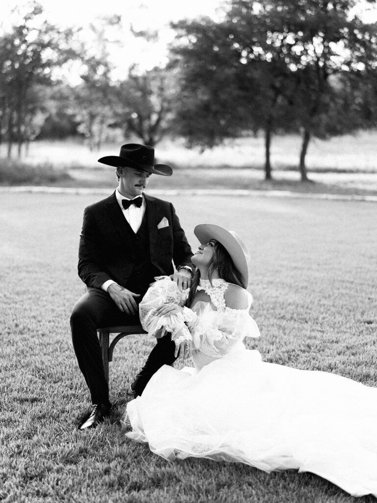 Bride and groom at The Adelphia wedding editorial in Lampasas, TX, surrounded by romantic florals and southern charm