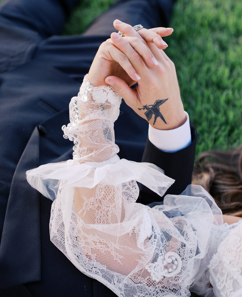 Bride and groom at The Adelphia wedding editorial in Lampasas, TX, surrounded by romantic florals and southern charm