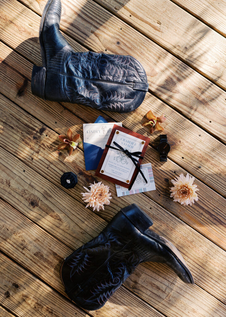 Refined wedding flat lay featuring romantic stationery by Anna & Ink, delicate florals, and timeless southern details.
