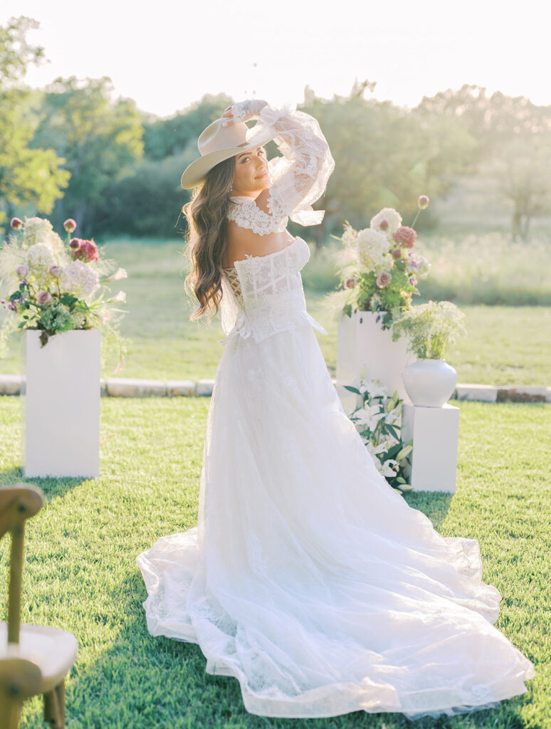 Bride and groom at The Adelphia wedding editorial in Lampasas, TX, surrounded by romantic florals and southern charm