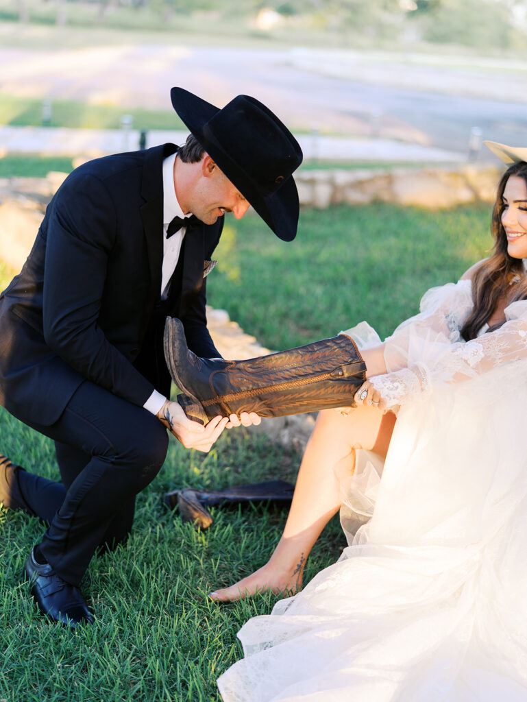 Bride and groom at The Adelphia wedding editorial in Lampasas, TX, surrounded by romantic florals and southern charm