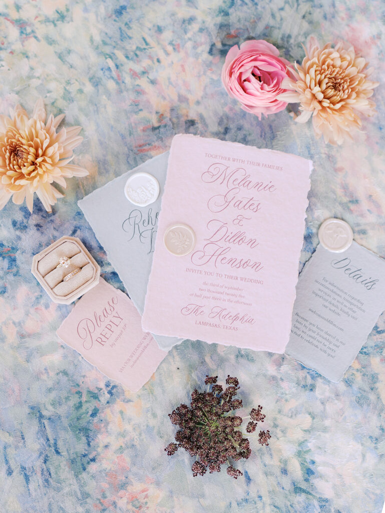 Refined wedding flat lay featuring romantic stationery by Anna & Ink, delicate florals, and timeless southern details.