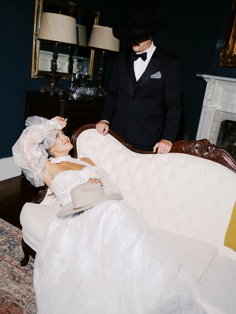 Bride and groom at The Adelphia wedding editorial in Lampasas, TX, surrounded by romantic florals and southern charm