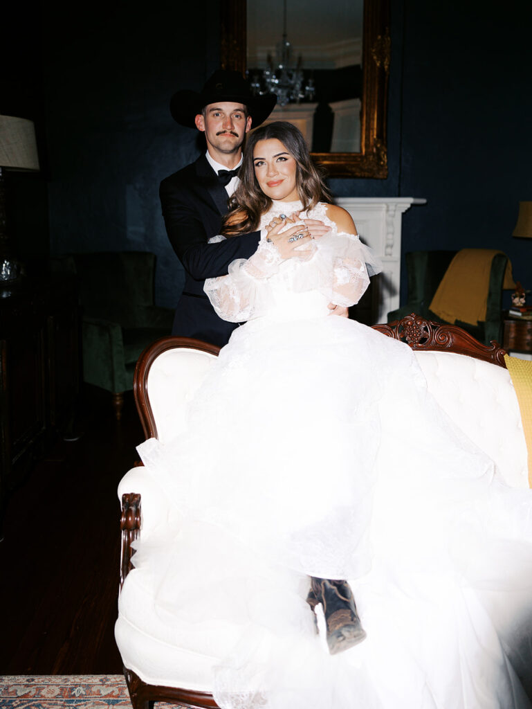 Bride and groom at The Adelphia wedding editorial in Lampasas, TX, surrounded by romantic florals and southern charm