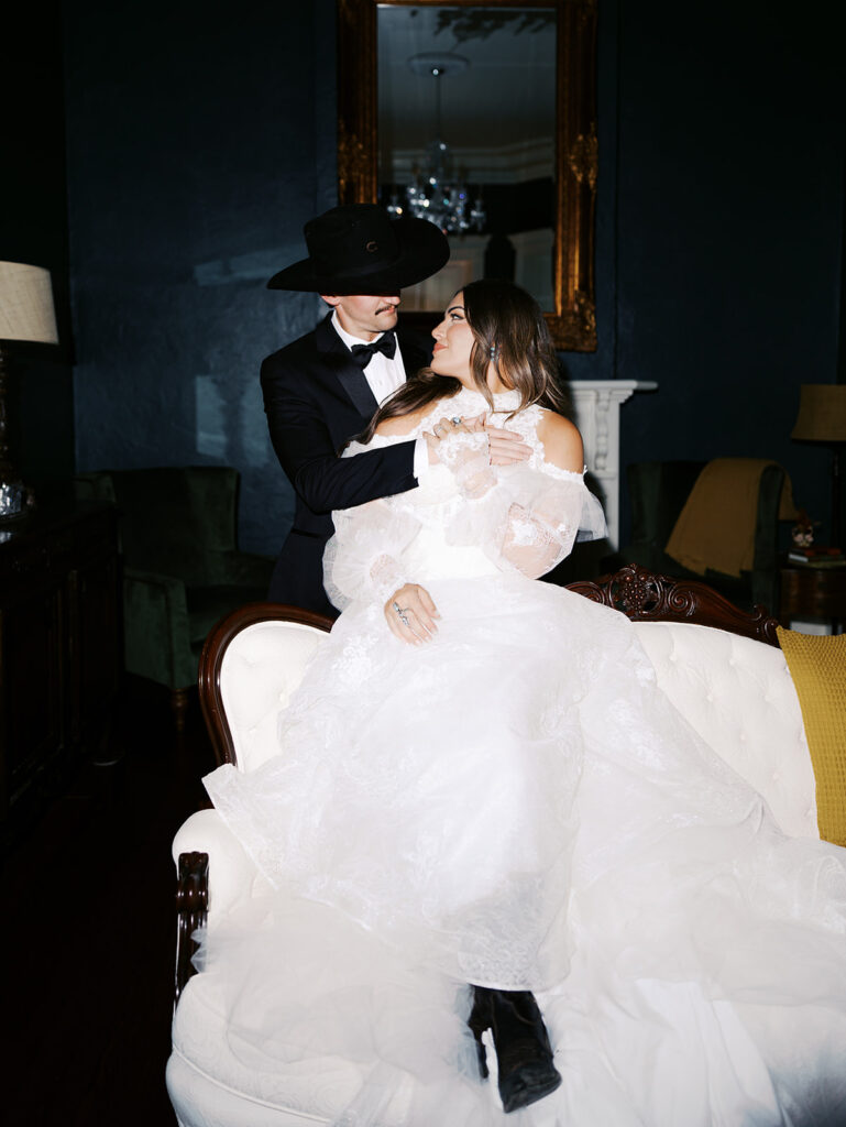 Bride and groom at The Adelphia wedding editorial in Lampasas, TX, surrounded by romantic florals and southern charm