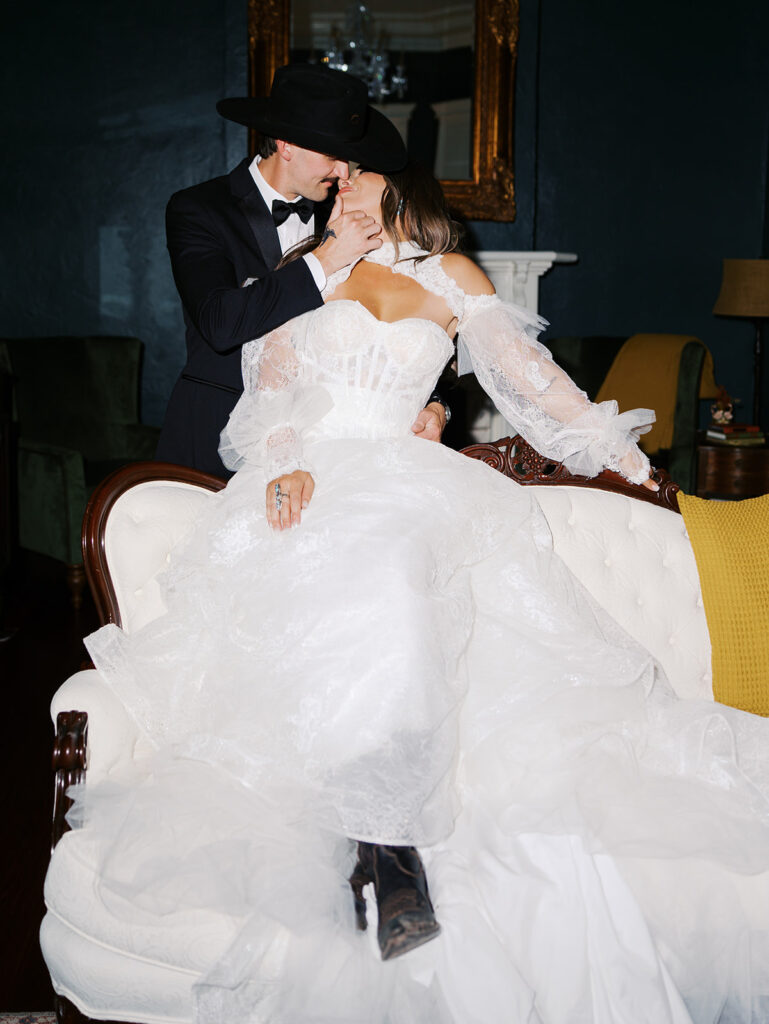 Bride and groom at The Adelphia wedding editorial in Lampasas, TX, surrounded by romantic florals and southern charm