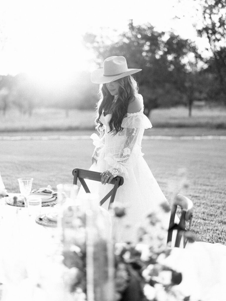 Bride and groom at The Adelphia wedding editorial in Lampasas, TX, surrounded by romantic florals and southern charm
