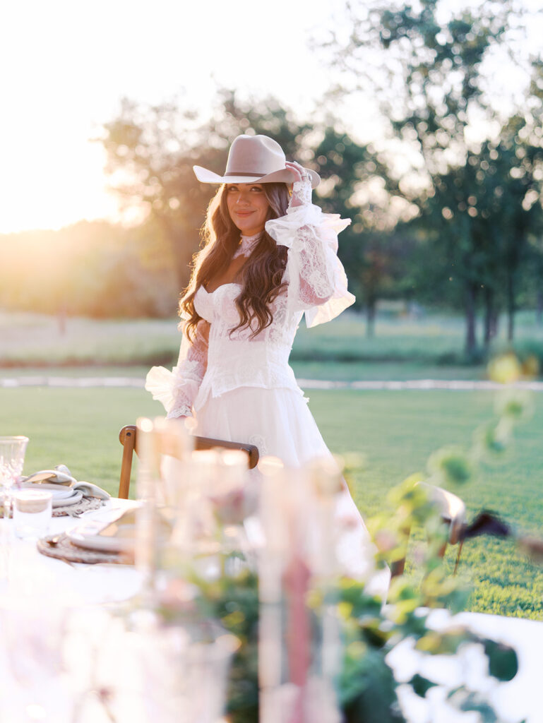 Bride and groom at The Adelphia wedding editorial in Lampasas, TX, surrounded by romantic florals and southern charm