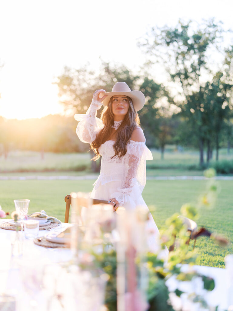 Bride and groom at The Adelphia wedding editorial in Lampasas, TX, surrounded by romantic florals and southern charm
